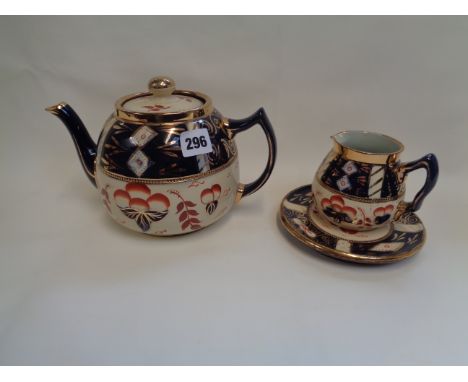 Ornate Sadler Gilded teapot, creamer and stand