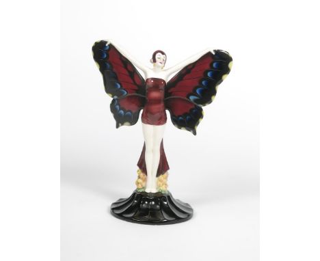 A rare Goldscheider Pottery Butterfly Girl figure designed by Josef Lorenzl,  model no.6366, standing on fluted base, facing 