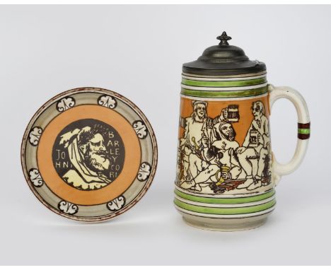 A Minton coaster and tankard designed by Henry Stacy Marks, the coaster printed in colours with a portrait of John Barleycorn