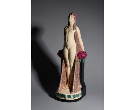 A large Charles Harva France Harva Art Deco pottery sculpture of a woman designed by O Zadory,  modelled naked but with elabo