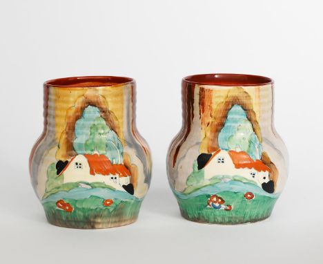 'Forest Glen' a pair of Clarice Cliff 565 vases, painted in colours, printed factory marks to one vase, 11.5cm. high, (2)