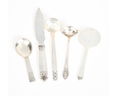 A Georg Jensen silver Pyramid serving spoon designed by Harald Nielsen, two various sauce ladles, a caddy spoon and a knife s