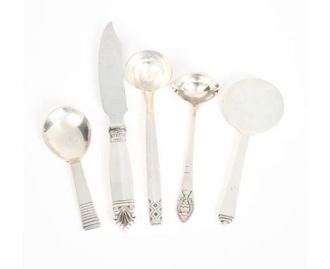 A Georg Jensen silver Pyramid serving spoon designed by Harald Nielsen, two various sauce ladles, a caddy spoon and a knife s