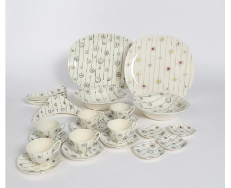 A collection of Midwinter Stylecraft Festival tableware designed by Jessie Tait, painted with atomic design in colours, inclu