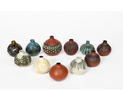 A large Poole Pottery Atlantis vase by Susan Dipple,  another similar urchin form by Beatrice Bolton, another similar by Jenn