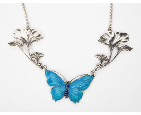 An American silver and enamel Butterfly necklace, naturalistically modelled and enamelled blue, with articulated foliate pane