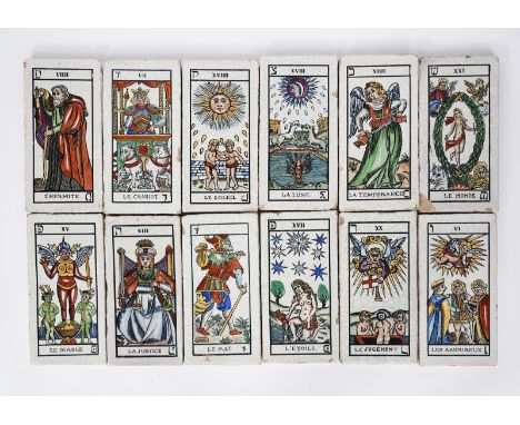 A set of twelve French ceramic tarot cards, each printed and painted in colours on a crackled white ground unsigned, minor lo