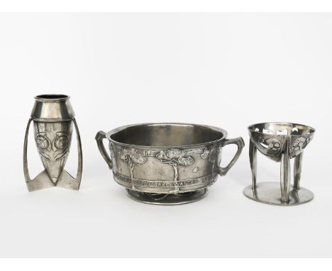 A Liberty &amp; Co pewter vase designed by Archibald Knox,  model no.0226, tapering bombe form with tripod foot, cast in low 
