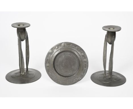A pair of Liberty &amp; Co English Pewter candlesticks designed by Archibald Knox, model no. 0223, slightly domed base with t