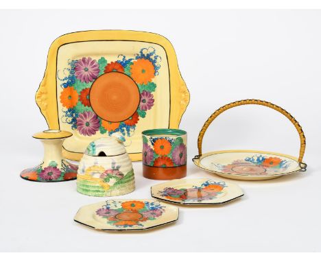 'Aurea' a Clarice Cliff Bizarre Beehive Honey pot and cover, painted in colours,  a Gay Day candlestick, two side plates, a C