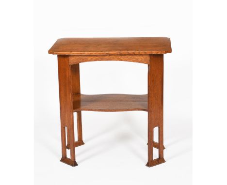 An Arts and Crafts oak occasional table, canted, rectangular top, with shaped lower shelf and angled plank legs with pierced 