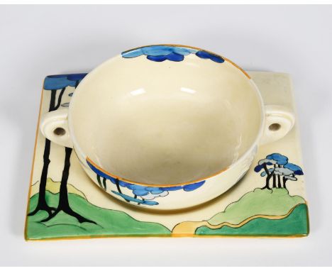 'Blue Firs' a Clarice Cliff Biarritz soup bowl and saucer,  painted in colours printed factory marks, 16.5cm. wide, (2)