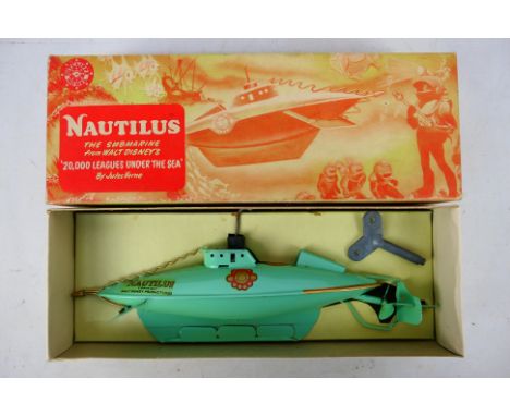 Sutcliffe - A boxed Sutcliffe 'Nautilus' clockwork submarine from the Walt Disney film '20,000 Leagues Under the Sea'. The mo