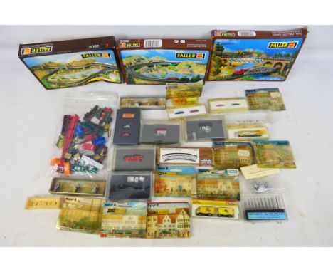 Faller - Noch - Marklin - An assortment of 28 boxed model Railway items in mostly Z scale, to include figures, vehicles, Layo