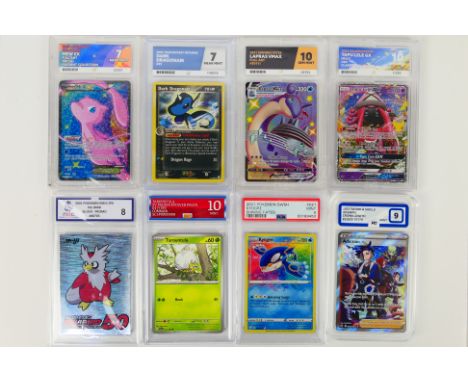 Pokemon - A graded collection of eight collectible Pokemon cards graded by various companies. Lot consists of 2004 Team Rocke