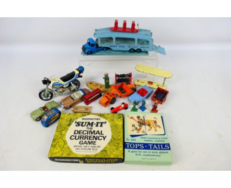 Dinky, Lesney, Corgi - a mixed lot of played with diecast vehicles to include: Dinky Pullmore car transporter, Triang Sunbeam