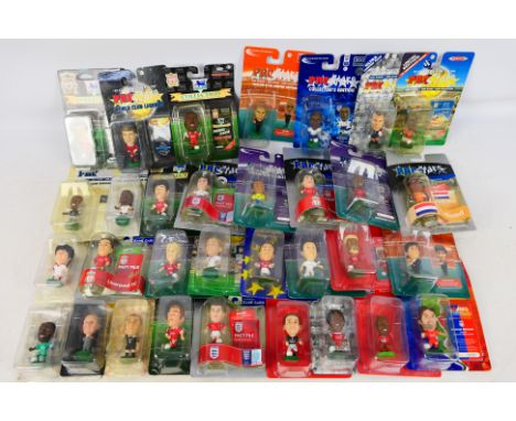 Corinthian - An assortment of 32 blister packed football figures to include #2486 Jason McAteer, #18929 Bill Shankly, #46618 