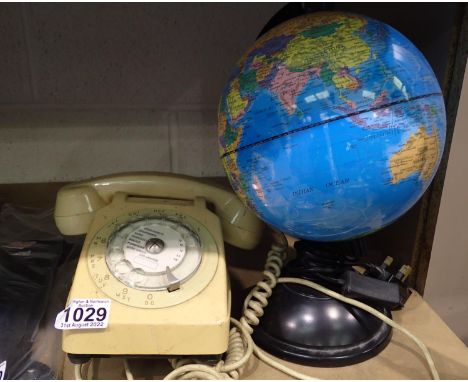 Ivory coloured Rotary telephone with separated listening device. All electrical items in this lot have been PAT tested for sa