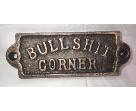 Cast iron Bull**** corner sign, W: 14 cm. P&amp;P Group 1 (£14+VAT for the first lot and £1+VAT for subsequent lots) 