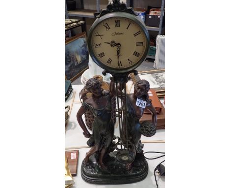 Large figural Juliana quartz clock, H: 80 cm. not working at lotting. Not available for in-house P&amp;P 