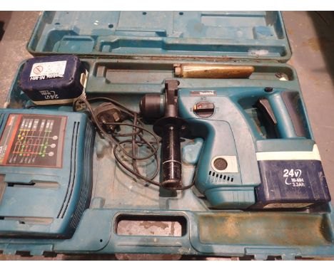 Makita BHR200 hammer drill with charger and two batteries. All electrical items in this lot have been PAT tested for safety a