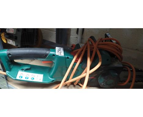 Ferrex WWPP 750 electric chainsaw. All electrical items in this lot have been PAT tested for safety and have passed. This doe