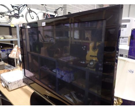 Samsung 40 inch flat screen TV with stand, no remote present. All electrical items in this lot have been PAT tested for safet