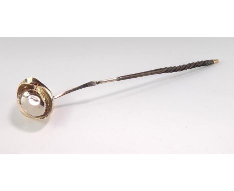 A George III silver toddy ladle, with a wrythen twist whalebone handle, 34.5cm long.