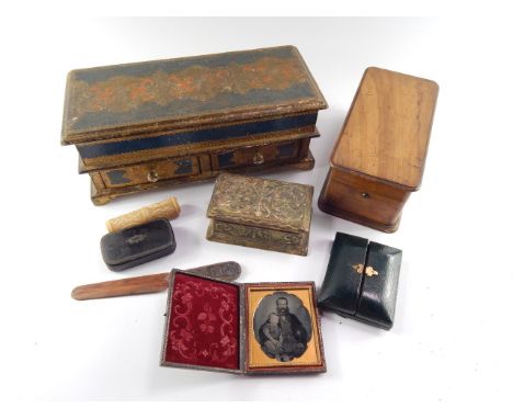A Victorian olive wood box containing portrait photographs, two painted boxes, cased daguerreotype, European carved bone need