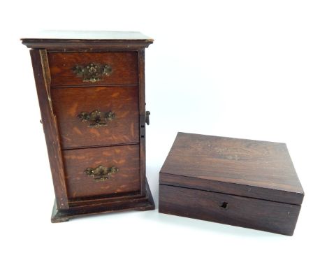 A Victorian rosewood sewing box, with brass ring handles, 23cm x 17.5cm x 8.5cm, and an oak cabinet of three graduated drawer