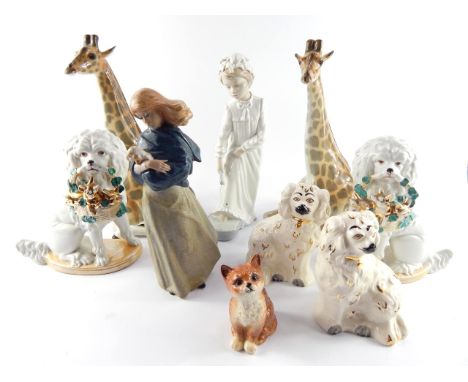 Two USSR porcelain figures of Giraffes, Nadal figure of a girl with a dog, Beswick seated cat, two pairs of dogs and a Nao fi