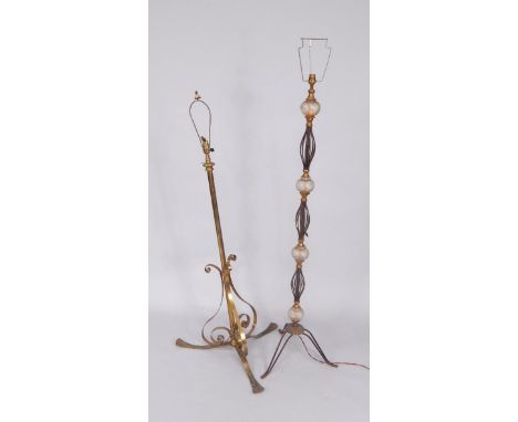A Victorian brass gas standard lamp base, converted to electricity, 109cm high, and a cast iron and glass standard lamp, 138c