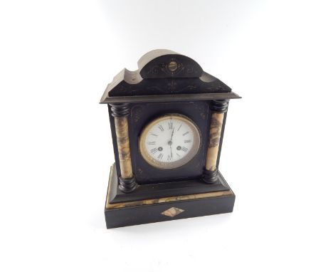 A Victorian slate and marble mantel clock of architectural form, enamel dial bearing Roman numerals, eight day movement with 