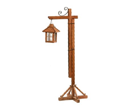 A 1930's carved oak lantern type light standard.