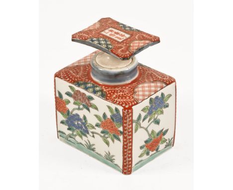 A Chinese polychrome lidded caddy, with character marks to lid.  Height 12 cm.