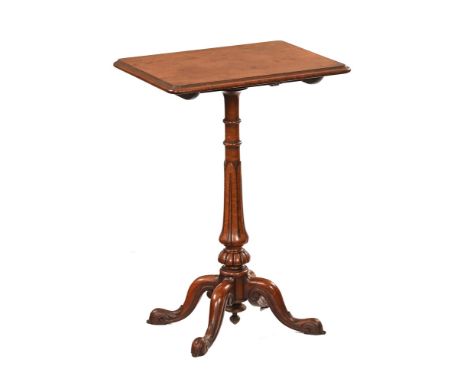 A Victorian mahogany tilt top occasional table, raised on a turned column with four carved legs.  Height 73 cm, width 51 cm, 