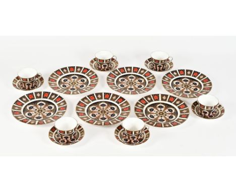 Royal Crown Derby eighteen pieces of Imari patterned large teacups, saucers and plates.  Cup height +/- 7.5 cm, diameter +/- 