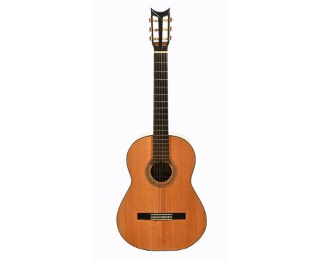 A classical guitar by AA Jones of Norwich, with gold label inscribed Concert Guitar and Flute Maker 1976, with rosewood backb