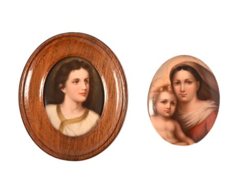 Two 19th century porcelain plaques, the first "The Cistine Madonna" depicting Jesus and Mary.  +/- 8.5 cm x 6.5 cm, impressed