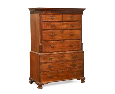 A George III mahogany tallboy, with moulded dentil cornice with blind fretwork carved frieze above two short and three long d