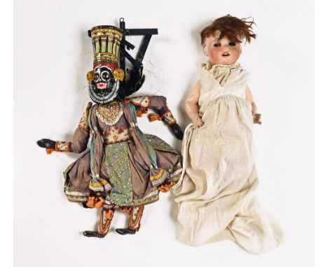 A Heubach Koppelsdorf 300.0 German bisque headed doll, with crying mechanism and a jointed composition body together with an 