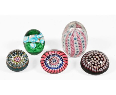 Five paperweights, the first with centralised P Cane for Perthshire, diameter +/- 6 cm, another probably Victorian with white