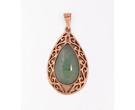 A 9 ct gold pendant, possibly jade.  Height excluding hanger 34 mm, width 21 mm.