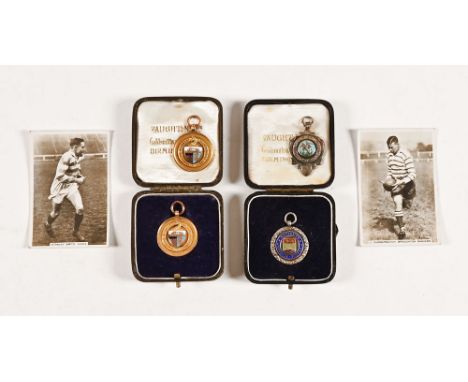 A collection of rugby and football medals, two 9 ct gold Workington Infirmary Charity Shield Competition winners badges 1927-