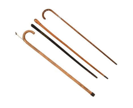 A vintage horse measuring walking stick and three others, one being silver mounted.   CONDITION REPORT:  The measuring stick 