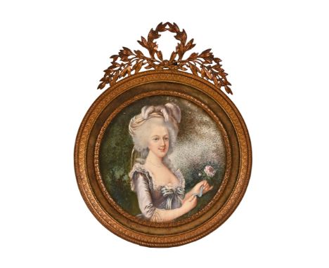 A Victorian portrait miniature on ivory of a lady, indistinctly signed Vesnies, image diameter 8.5 cm in a circular gilt fram