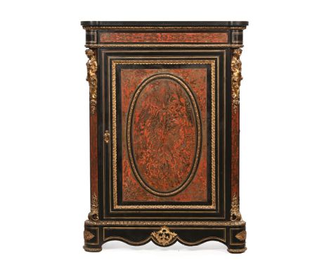 A 19th century boulle and ormolu mounted cabinet, with single door with oval panel to the centre opening to two adjustable sh