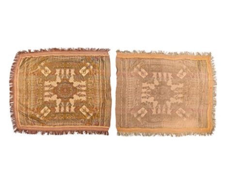 Two Egyptian fringed tapestry wall hangings or bed covers, circa 1930 in a variety of colours depicting fresco scenes, figure