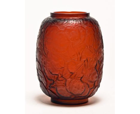 A Lalique moulded glass vase, decorated in relief with leaves impressed marked R Lalique to base.  Height 23.5 cm.   CONDITIO