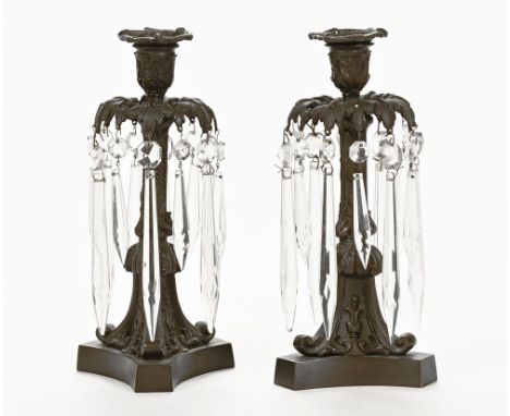 A pair of Regency bronze lustres, with glass droppers.  Height 26 cm.